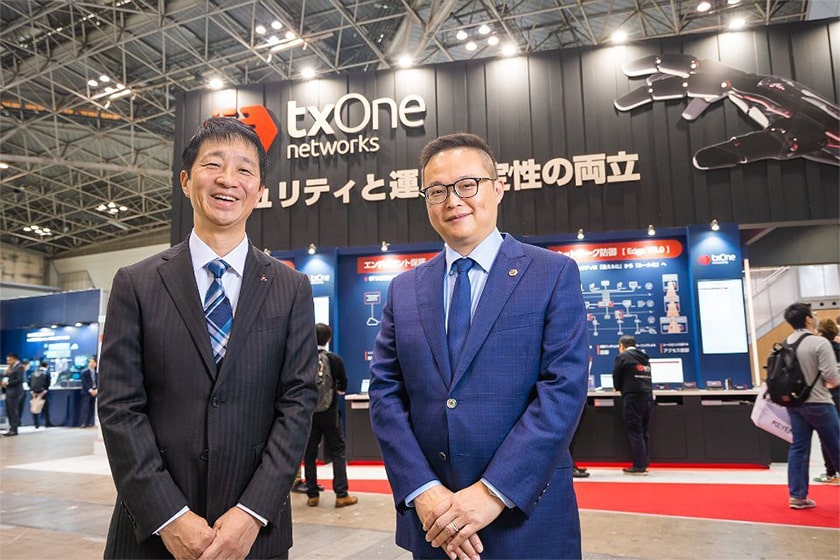 三菱電機OTセキュリティ事業推進部長の柴田剛志氏(左)と、TXOne Networks CEOの劉栄太(テレンス・リュウ)氏